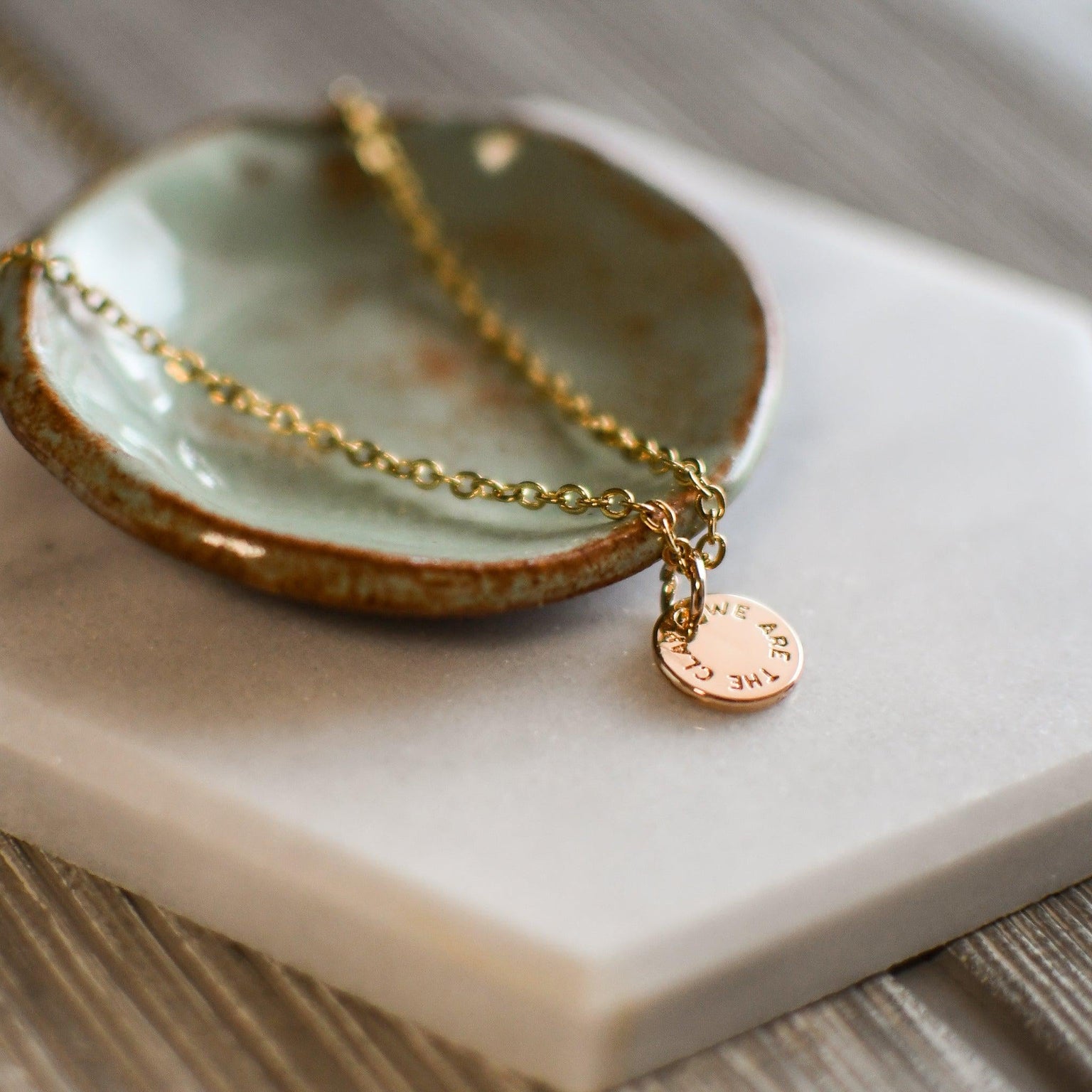 We are the Clay Gold Coin Necklace