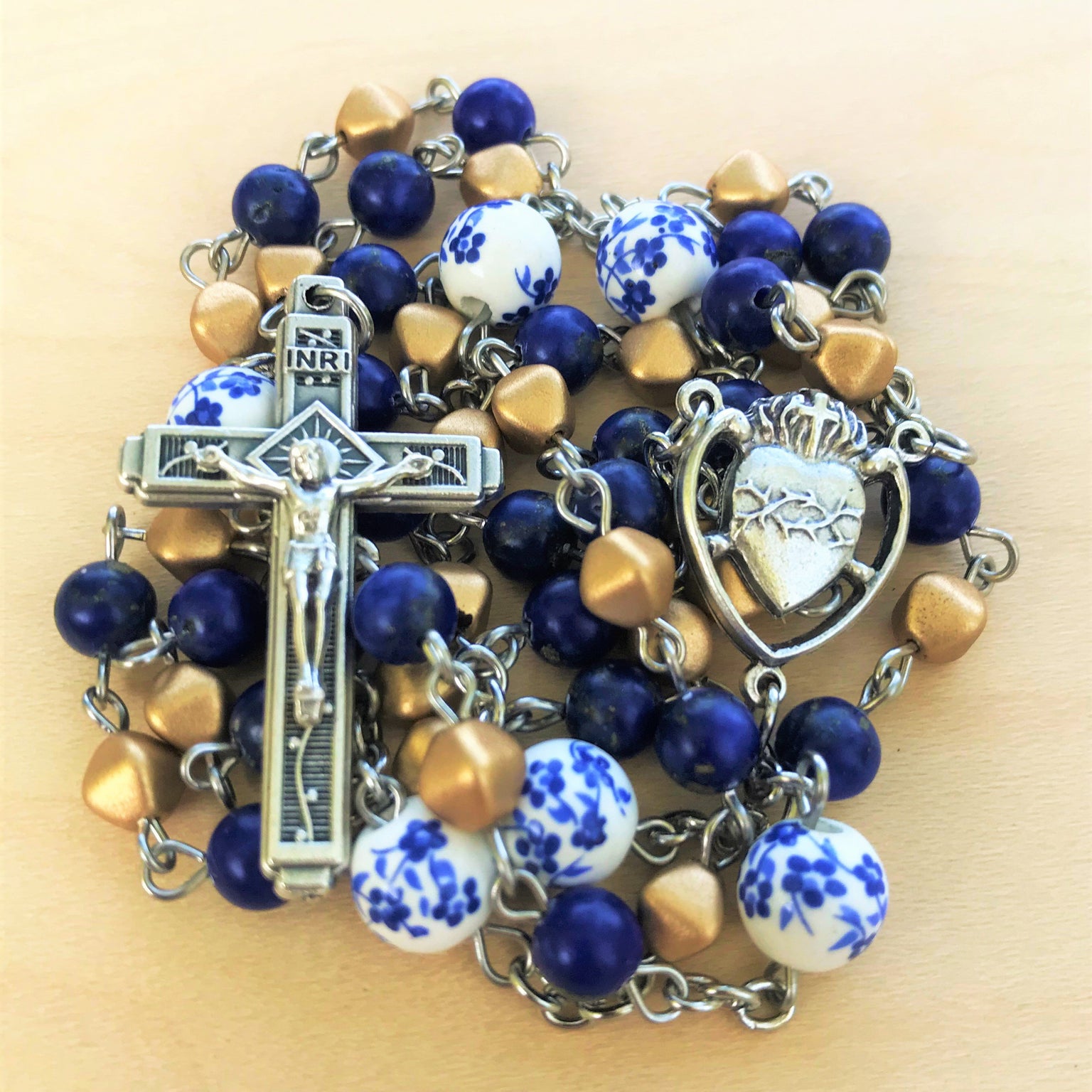 Born Again Rosaries' Indiana Gold rosary close-up.